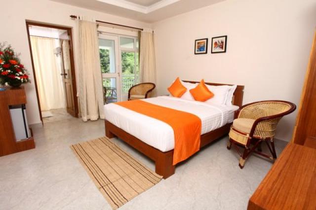 Monsoon Grande Hotel Munnar | Book Rooms in Monsoon Grande Hotel Kerala
